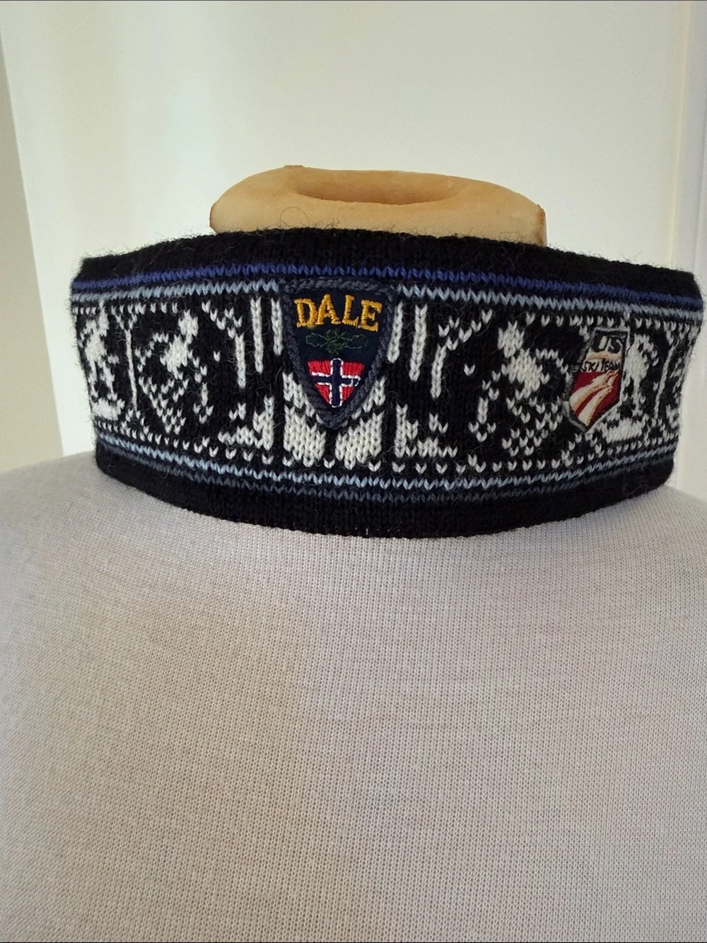 Dale of Norway nordic pattern wool headband with US Ski team logo .